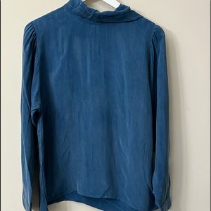 This is a blouse, the brand is Amour Vert, size M.